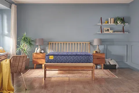tempur-adapt-medium-man-laying-down-side-view